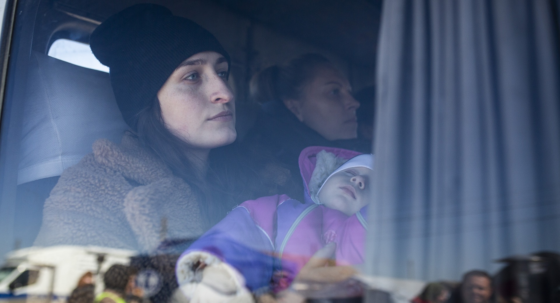 Ukrainian refugees arrive by bus in Palanca, a town on the border of Moldova and Ukraine.