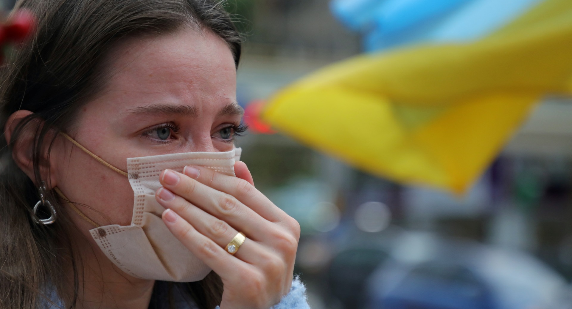 A woman at a rally in support of the people of Ukraine.